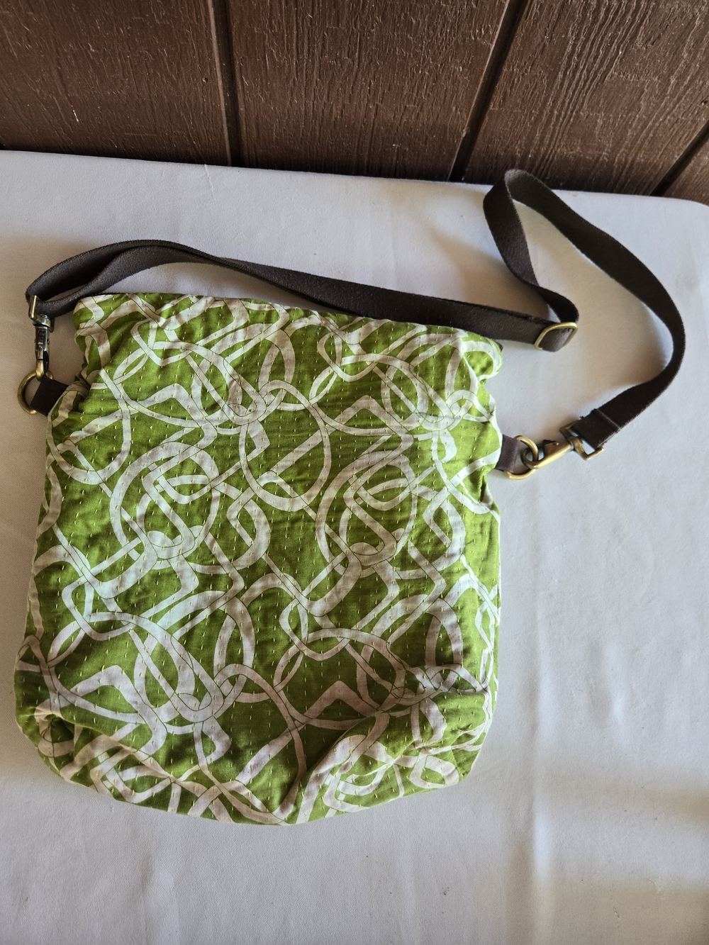 Quilted Crossbody Bag with White Linked Geometric Designs